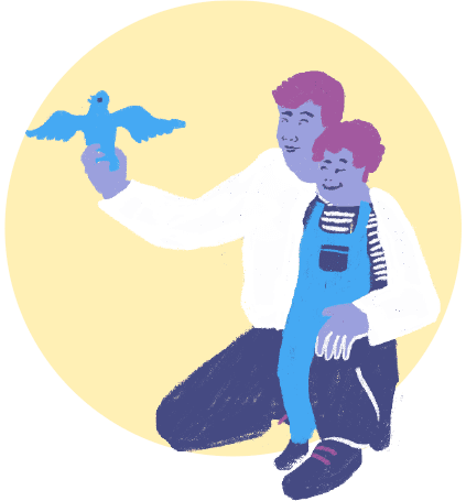 An adult knealing with a bird in one hand a young child on his knee